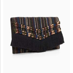 Taj metallic clutch